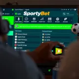 Nigerian football fans engaging with betting options on Chelsea matches on digital devices